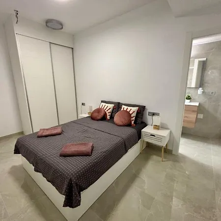 Appartement Near Playa De Cura With A Rooftop Swimming Pool